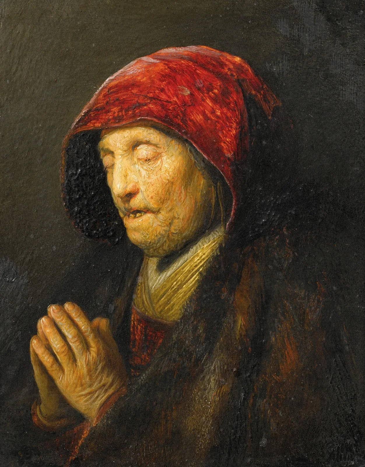 Old woman praying av Rembrandt van Rijn
