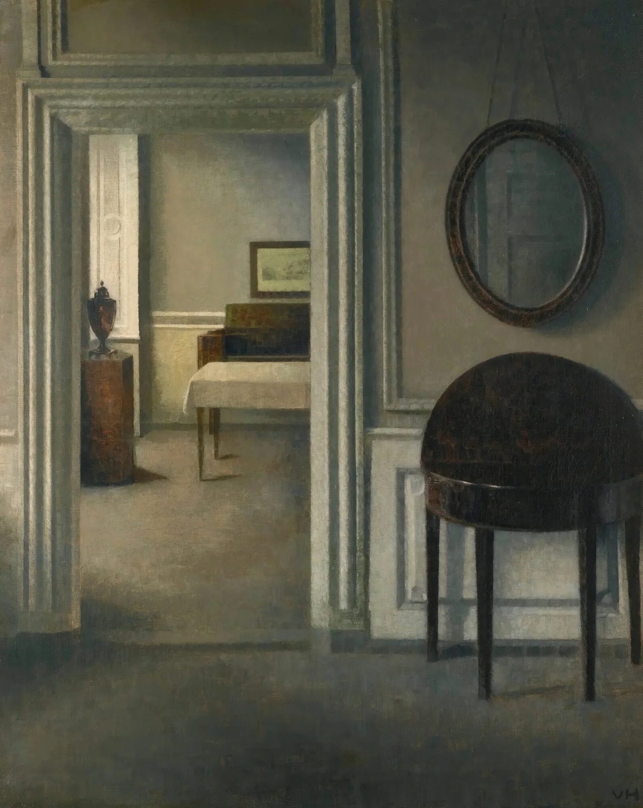 Interior With A Mirror av Vilhelm Hammershøi